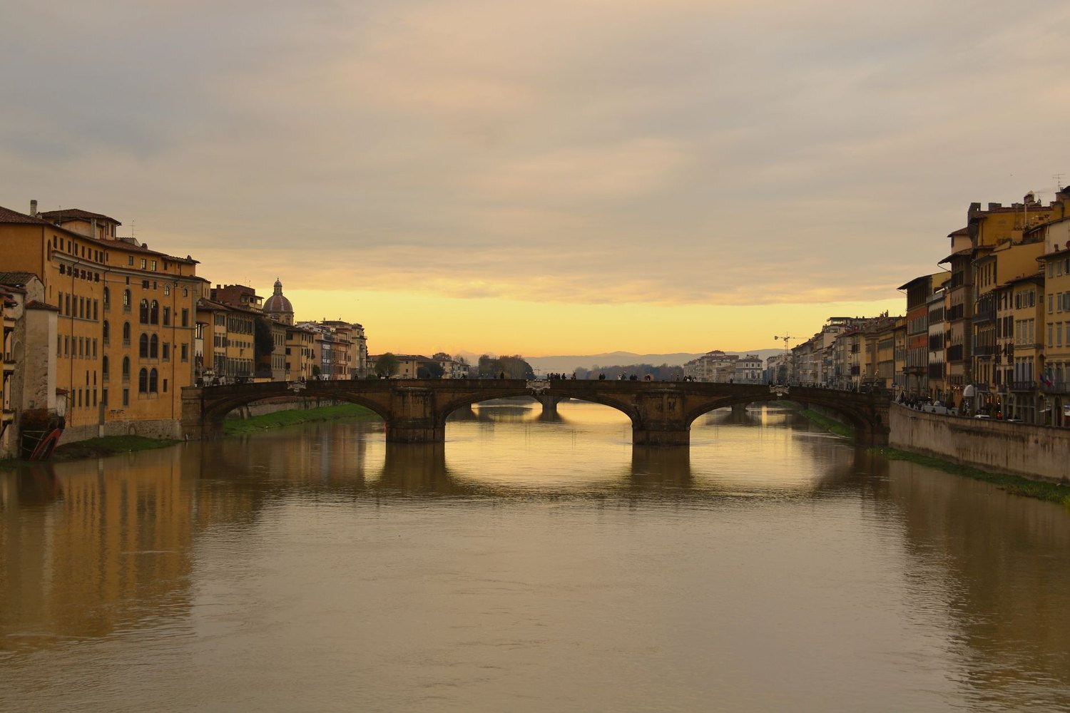 The Ponte Vecchio over the Arno in Florence at sunset