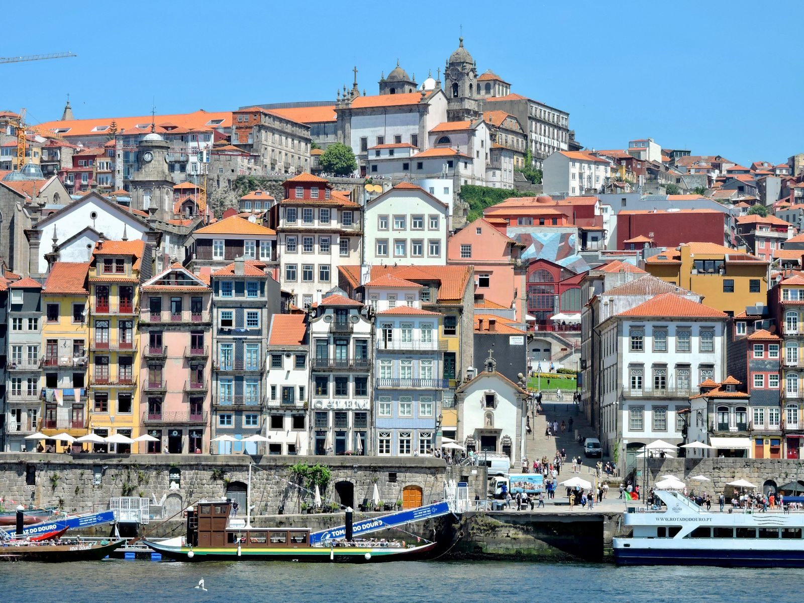 The colourful houses of Porto's Ribeira district stacked above the Douro.