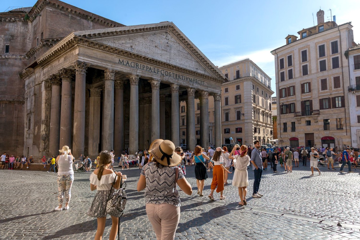 Tourists crossing the square in front of the Pantheon in Rome